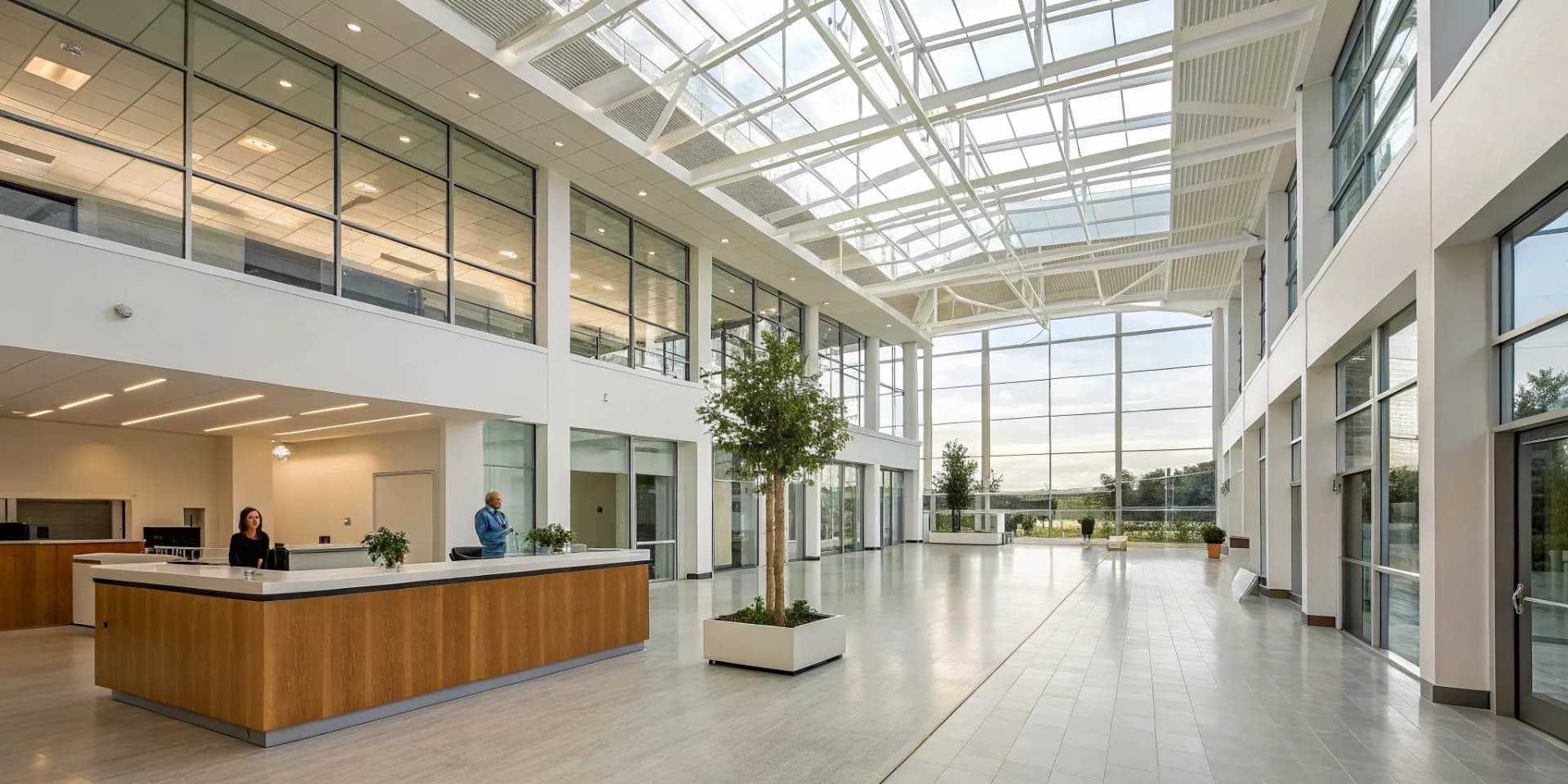 Reception desk in the lobby of a modern multi-disciplinary chiropractic clinic.
