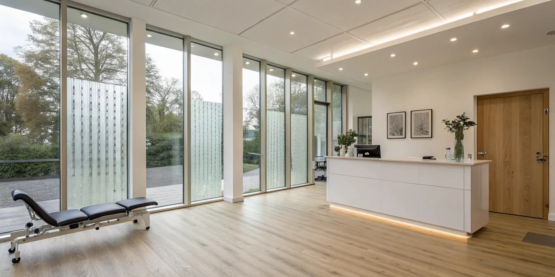 Modern chiropractic clinic reception using automation and a digital check-in desk to grow the practice.